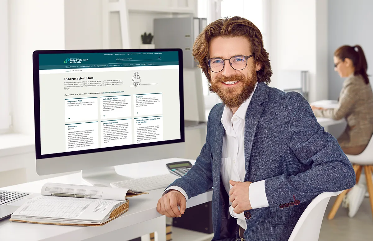 Businessman with a monitor showing a supplier web portal